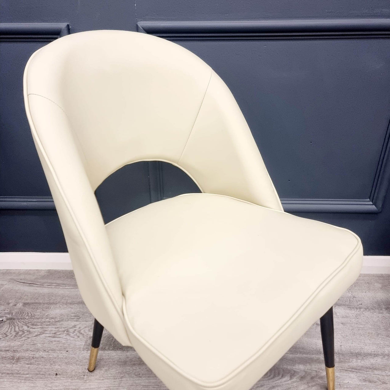Astra Leather Dining Chair with Scandinavian Black Legs and Gold Tips in Beige PU or Plush Velvet - UK Luxury Furniture